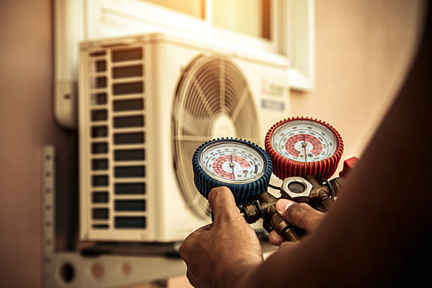 Professional Air Conditioning Service technician working in Levittown, PA